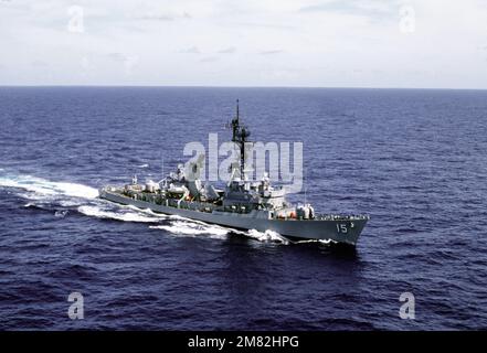 An aerial starboard bow view of the guided missile destroyer USS BERKELEY (DDG-15) underway. Country: Unknown Stock Photo