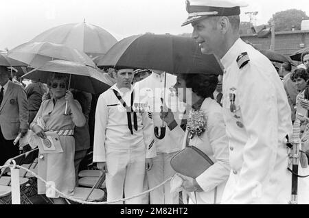 Retired Commander Eleonore B. Rickover, sponsor, is escorted to her seat on the speakers platform for the commissioning of the nuclear-powered attack submarine USS HYMAN G. RICKOVER (SSN 709) at the General Dynamics Electric Boat Division. Mrs. Rickover is the wife of the ship's namesake. Base: Naval Submarine Base, Groton State: Connecticut (CT) Country: United States Of America (USA) Stock Photo