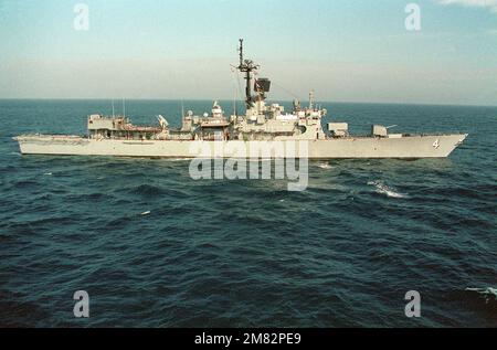 An aerial starboard beam view of the Brooks class guided missle frigate USS TALBOT (FFG-4) underway. Country: Unknown Stock Photo