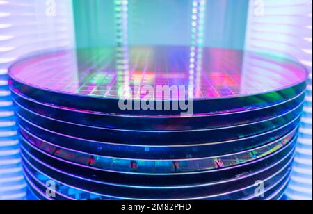 Silicon Wafer Under Cleanroom Fabrication in plastic holder box Stock Photo