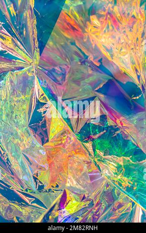 Holographic plastic wrinkled film with contrast light reflections Stock Photo