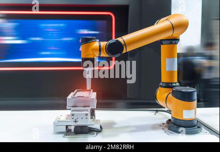 intelligence machine working in mobile phone factory,Smart factory industry 4.0 concept. Stock Photo