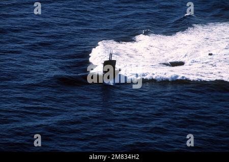 A port bow view of the nuclear-powered attack submarine USS OMAHA (SSN-692) underway. Country: Unknown Stock Photo