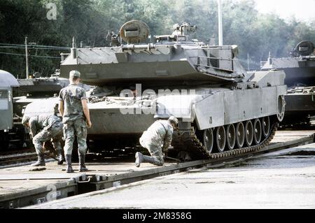 An M-163 Vulcan self-propelled anti-aircraft gun moves across an armored vehicle launched bridge onto a truck during exercise Reforger '85. Subject Operation/Series: REFORGER '85 Base: Bonnland Country: West Germany (FRG) Stock Photo