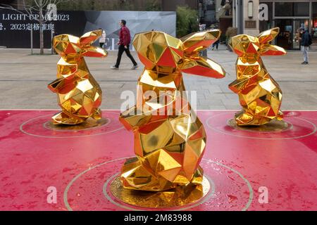 SHANGHAI, CHINA - JANUARY 12, 2023 - More than 10 'golden rabbits' are seen on Nanjing Road pedestrian street in Shanghai, China, January 12, 2023. Stock Photo