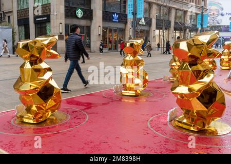 SHANGHAI, CHINA - JANUARY 12, 2023 - More than 10 'golden rabbits' are seen on Nanjing Road pedestrian street in Shanghai, China, January 12, 2023. Stock Photo