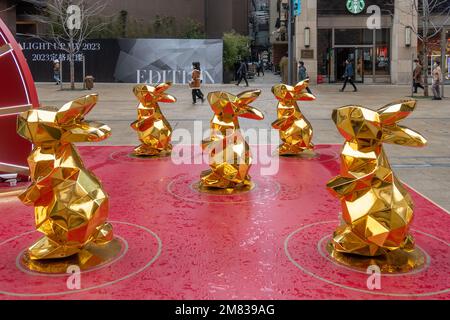 SHANGHAI, CHINA - JANUARY 12, 2023 - More than 10 'golden rabbits' are seen on Nanjing Road pedestrian street in Shanghai, China, January 12, 2023. Stock Photo