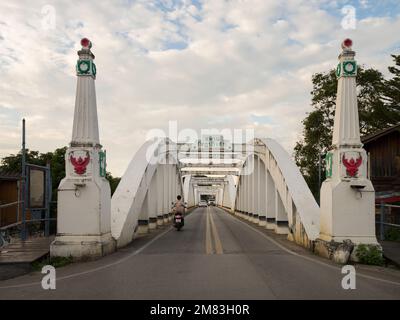 Lampang, Thailand - November 21, 2022 . Known as Ratsadaphisek Bridge or White Bridge over Wang River. It is the landmark of Lampang city. Stock Photo