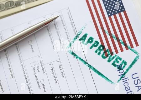USA visa approved rubber stamp and application form Stock Photo