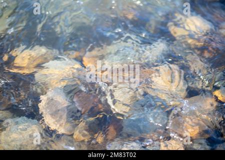 Crystal clear clean and see through water with clear pebble of the river swat Stock Photo