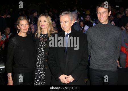 Bernard Arnault's daughter Delphine (R) and French fashion stylist Pierre  Cardin pose beside items on display after a press conference at the  occasion of Christian Dior's centenary at the headquarters of Christian