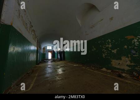 People exploring abandoned building together Stock Photo