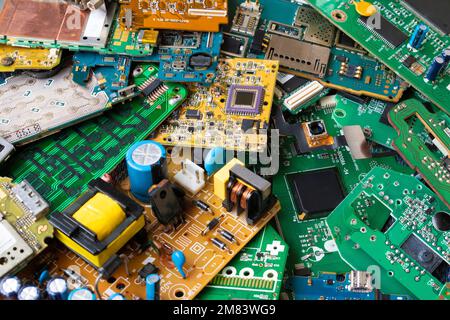 Pile of scrap electronic circuit boards for recycling Stock Photo