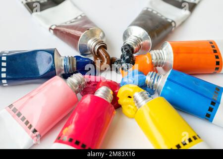 Colorful paint tubes on a white background Stock Photo