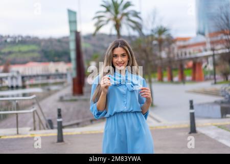 A portrait of young female posing in the city Stock Photo