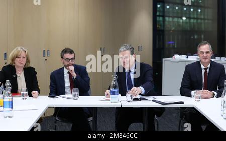 (Left-right) Shadow leader of the House of Lords Baroness Angela Smith, Stuart Anderson Head of Public Affairs, Northern Ireland Chamber of Commerce and Industry, Labour leader Sir Keir Starmer and Peter Kyle Shadow Secretary of State for Northern Ireland during a Brexit Business Working Group breakfast at KPMG offices in Belfast. Picture date: Thursday January 12, 2023. Stock Photo