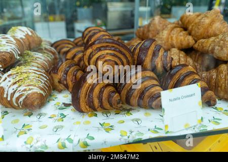 Kuala Lumpur, Malaysia - December 11th, Chocolate Croissants and baked pastries on display at cafe. Stock Photo