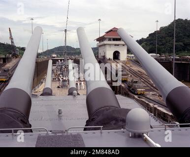 A view from the No. 2 Mark 7 16-inch/50-caliber gun turret aboard the battleship USS IOWA (BB-61) as the ship passes through the Pedro Miguel Locks while transiting the canal. Base: Panama Canal Country: Panama (PAN) Stock Photo