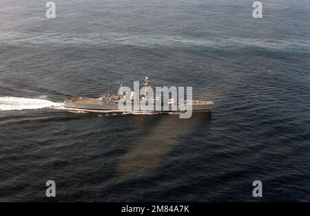 An aerial starboard beam view of a British Leander Class frigate underway. Country: Pacific Ocean (POC) Stock Photo