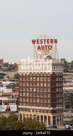 A vertical shot of the Western auto sign on a building in downtown Kansas City, United States. Stock Photo