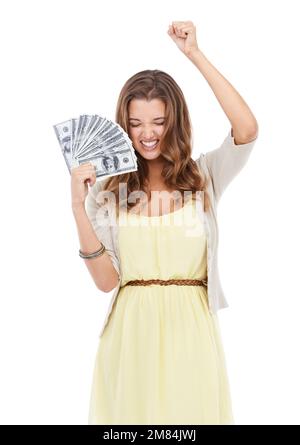 Shes a wealthy young woman. A beautiful young money holding money isolated on white. Stock Photo