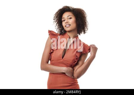 She knows how to work the camera. A gorgeous ethnic woman with a sassy attitude smiling at the camera. Stock Photo