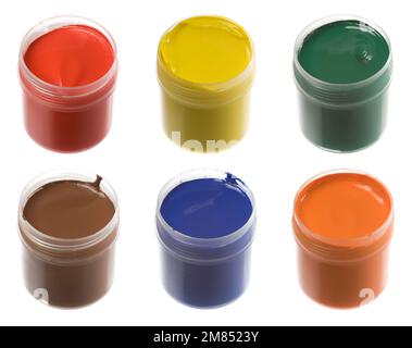 Different colors gouache paints in jars on white Stock Photo