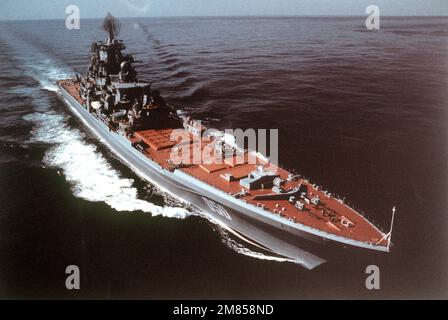 A starboard bow view of the Soviet Kirov Class nuclear-powered guided missile cruiser FRUNZE underway. (Soviet Military Power, 1986). Base: Cruiser Frunze Stock Photo