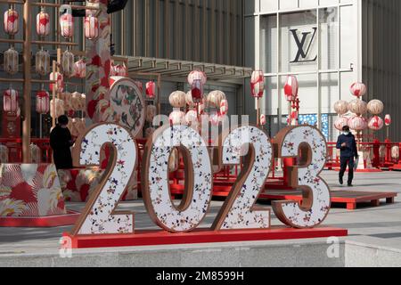 SHANGHAI, CHINA - JANUARY 12, 2023 - Pedestrians walk past the LOGO of 2023 on Xujiahui Street in Shanghai, China, January 12, 2023. Stock Photo