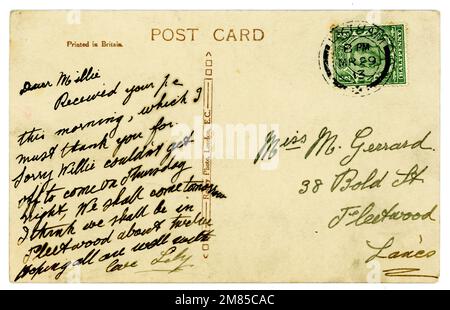 Reverse of original handwritten Titanic era postcard, franked and with King George V half penny postage stamp. Postmarked / dated  March 1913. Stock Photo