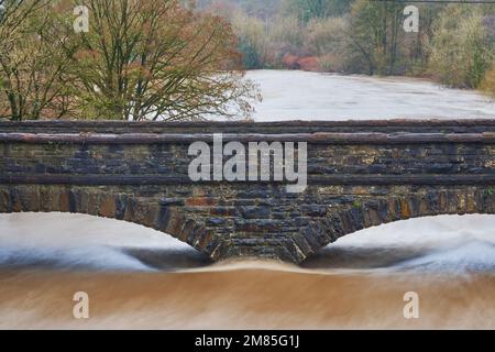 The Ynys Bridge over the River Taff, Cardiff, South Wales, after heavy rain January 2023 Stock Photo