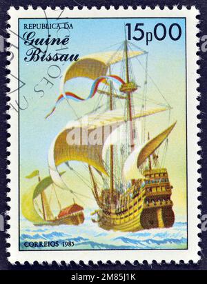 Cancelled postage stamp printed by Guinea Bissau, that shows Dutch Carrack sailing ship, 17th century, circa 1985. Stock Photo