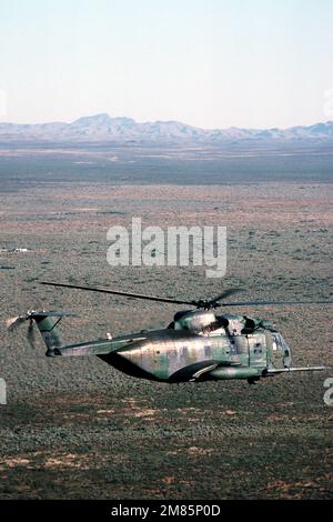 An air-to-air right side view of an HH-3E Jolly Green Giant helicopter during Exercise Patriot Coyote. Subject Operation/Series: PATRIOT COYOTE State: New Mexico (NM) Country: United States Of America (USA) Stock Photo