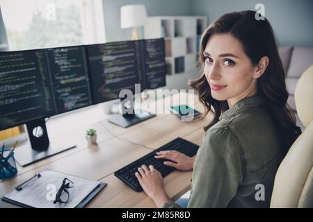 Profile side photo of successful employee lady hardware expert hand keyboard fix bugs failure system error 404 indoor room workstation Stock Photo