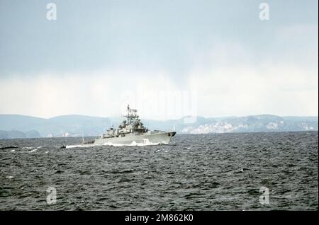 A starboard bow view of the Soviet Krivak class frigate DRUZHNYY observing NATO ships participating in exercise Northern Wedding '86. Subject Operation/Series: NATO EXERCISE NORTHERN WEDDING '86 Country: Unknown Stock Photo