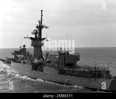 A port quarter view of the frigate USS DOWNES (FF 1070) underway ...