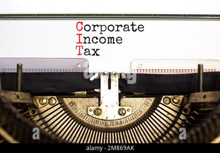 CIT corporate income tax symbol. Concept words CIT corporate income tax typed on old retro typewriter. Beautiful white background. Business and CIT co Stock Photo