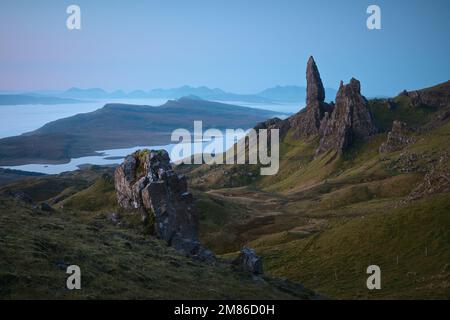 Atmospheric view from above of the tall, sharp cliffs overlooking the lake and the sea. The Old Man of Storr, The Isle of Skye, Scotland, UK Stock Photo