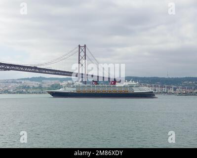The 25 de Abril Bridge is a suspension bridge in Portugal over the Tagus connecting the city of Lisbon, capital of Portugal, to the city of Almada. Stock Photo