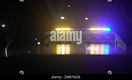 Emergency Ambulance lights blinking at night Stock Photo