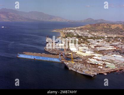 An aerial view of various ships moored at the Naval Ship Repair Facility. Base: Naval Station, Subic Bay State: Luzon Country: Philippines (PHL) Stock Photo