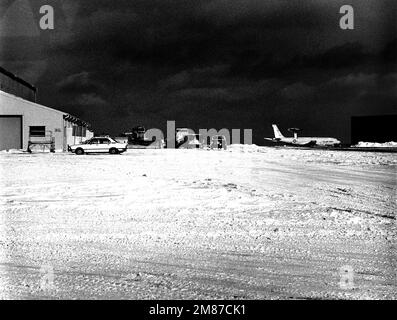 Snow removal operations take place on the flight line between Building 832 and Building 885. Base: Naval Air Station, Keflavik Country: Iceland (ISL) Stock Photo