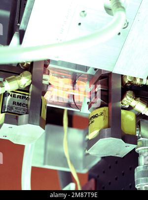 A close-up view of a piece of material in place in an elevated temperature ceramic composite test system. The system was designed by engineers from the University of Dayton Research Institute and the Metals Behavior Branch of the Air Force Wright Aeronautical Laboratories (AFWAL). Ceramic composites are being studied as possible replacements for the nickel-based superalloys used in the hot sections of aircraft turbine engines. Base: Wright-Patterson Air Force Base State: Ohio (OH) Country: United States Of America (USA) Stock Photo