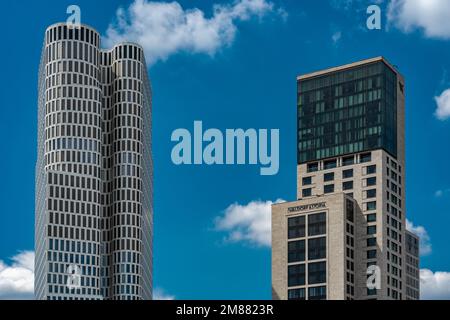 Berlin, Germany - June 26 2022: Closeup view of Hotel Motel One Berlin and Waldorf Astoria Berlin - isolated skyscrapers of Berlin with blue sky Stock Photo