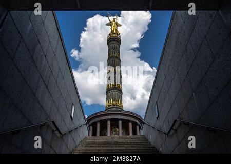 The Victory Column (Siegessäule) of Berlin with the golden angel statue - named Goldelse - on top, shot from the underground during clear weather Stock Photo