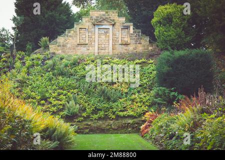 The Eyecatcher ruin at the end of the target range at Brodsworth Hall and Gardens, a folly with faux blind doorway and windows Stock Photo