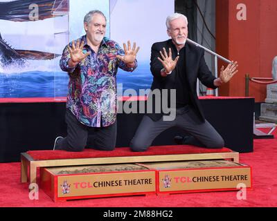 January 12, 2023, Los Angeles, California, USA: (L-R) JON LANDAU and JAMES CAMERON show their cement hands at ceremony honoring 'Avatar: The Way Of The Water' filmmakers James Cameron and Jon Landau at TCL Chinese Theatre. (Credit Image: © Billy Bennight/ZUMA Press Wire) EDITORIAL USAGE ONLY! Not for Commercial USAGE! Stock Photo