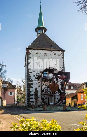 Sculpture Wheel Stage by Helmut Lutz in front of the Hagenbach Tower, Breisach, Breisgau, Upper Rhine, Black Forest, Baden-Wuerttemberg, Germany Stock Photo