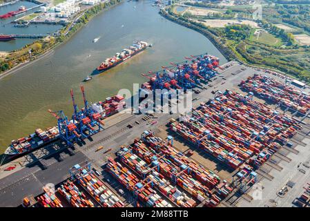 Aerial view of the container ship Montreal Express of Hapag Lloyd on the Suederelbe, the container ship has to be turned around to dock and load. Two Stock Photo