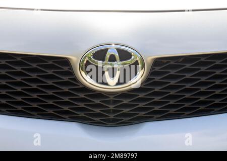 An image of the Toyota logo can be seen on the front of the car Stock Photo